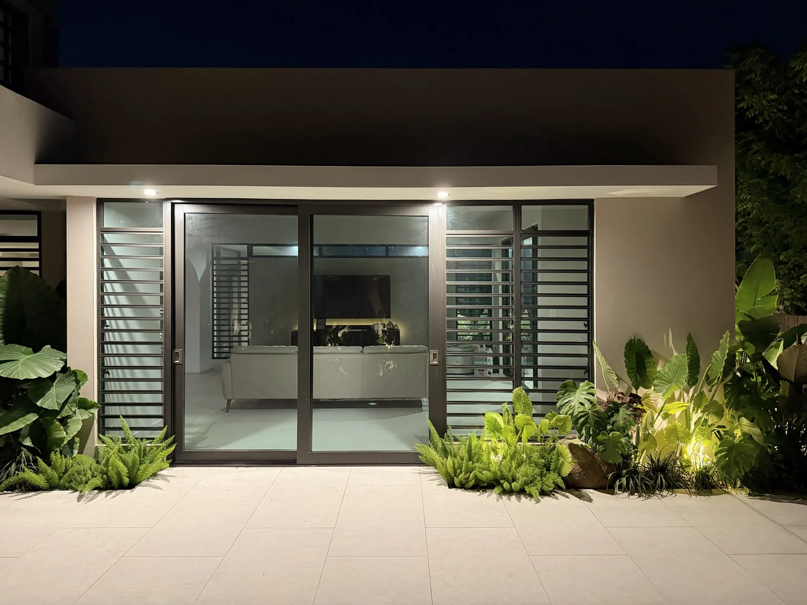 Paseo Real Addition — living room entrance at night